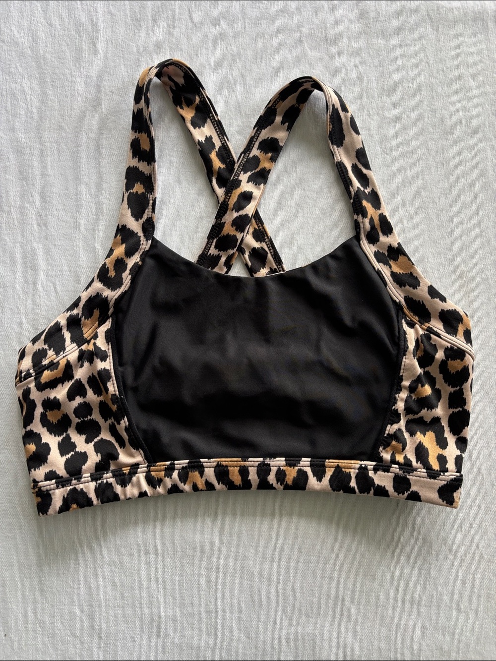 Kate Spade x Beyond Yoga Leopard-Print Crossback Sports Bra in Black & Tan